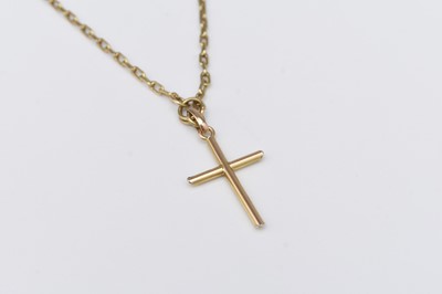 Lot 262 - A yellow metal crucifix pendant on chain