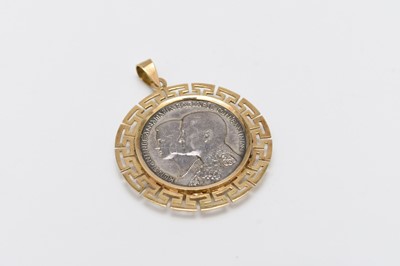Lot 269 - A 1964 Greek Drachma coin set in yellow metal Greek key design pendant mount