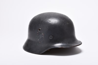 Lot 305 - WW2 German M40 helmet shell with post-war decal and a Walther style holster