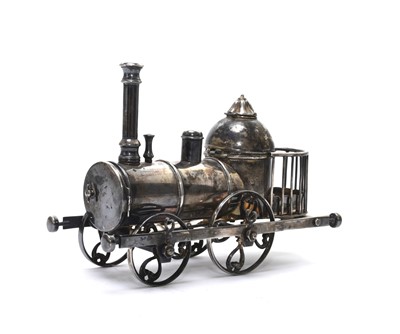 Lot 49 - An unusual silver plated ink stand in the form of a steam engine