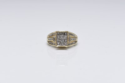 Lot 146 - A 9ct gold square cut diamond panel ring