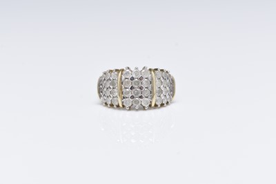 Lot 215 - A 9ct gold graduated brilliant cut diamond panel cluster ring