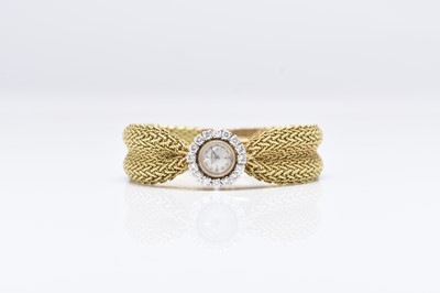 Lot 331 - Jaeger-LeCoultre: A lady's 18ct gold diamond set bracelet watch