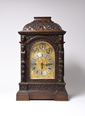 Lot 71 - A large and impressive carved oak musical chiming bracket clock