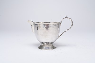 Lot 54 - A Guild of Handicrafts silver cream jug