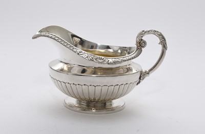 Lot 34 - A George III silver cream jug
