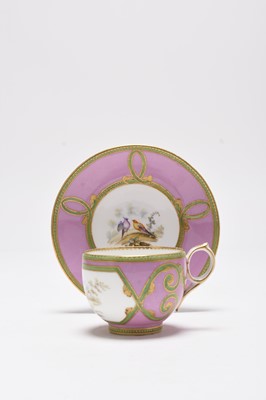 Lot 71 - A Coalport teacup and saucer painted with exotic birds by John Randall, circa 1860