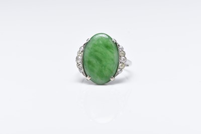 Lot 228 - An Art Deco jade and diamond ring