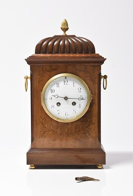 Lot 72 - A French marquetry inlaid mahogany mantel clock