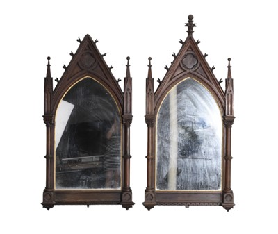Lot 125 - A pair of late Victorian gothic revival stained pine wall mirrors