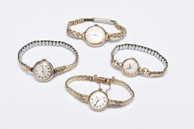 Lot 472 - A group of four lady's 9ct gold bracelet watches
