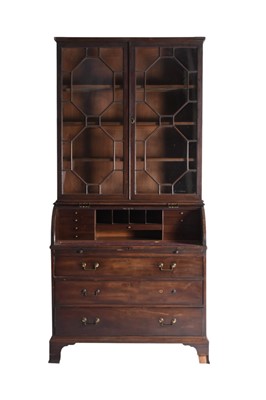 Lot 104 - A George III mahogany tambour-top bureau bookcase