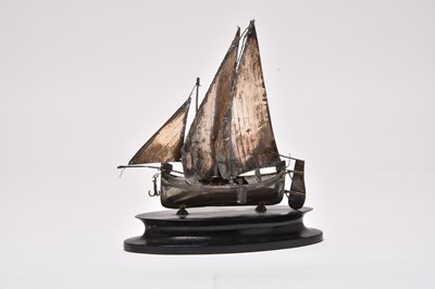 Lot 257 - A white metal model of a Junk