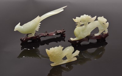 Lot 63 - A group of three Chinese jade carvings, 20th century