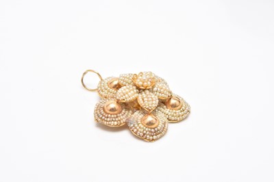 Lot 310 - A 19th century seed pearl flower pendant
