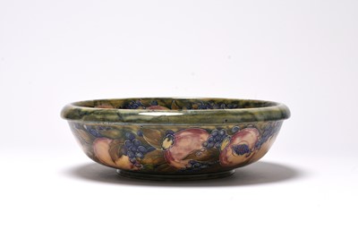 Lot 95 - William Moorcroft 'Pomegranate' fruit bowl for Liberty & Co