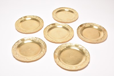 Lot 167 - A set of six George V silver gilt plates