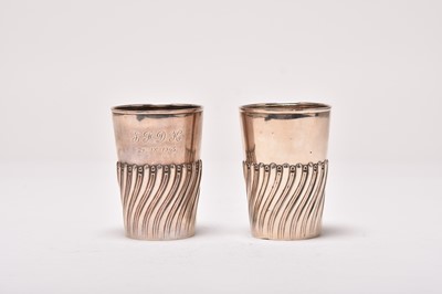 Lot 19 - A pair of silver beakers