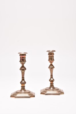Lot 25 - A pair of silver candlesticks