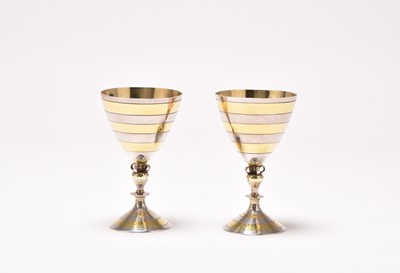 Lot 2 - A pair of silver and gilt goblets
