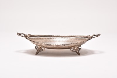 Lot 79 - A white metal two handled serving bowl
