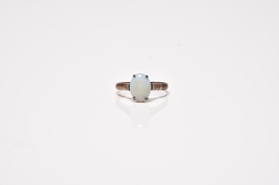 Lot 183 - A single stone opal ring