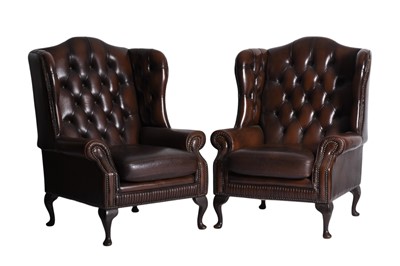 Lot 122 - A pair of leather Chesterfield armchairs