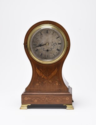Lot 82 - A good Edwardian inlaid mahogany balloon mantle timepiece