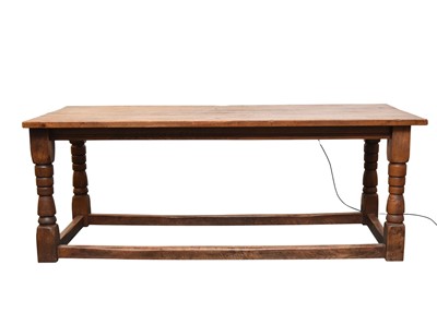 Lot 316 - A reproduction oak refectory type dining table and chairs
