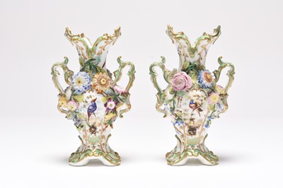 Lot 59 - A pair of Coalport Coalbrookdale floral-encrusted vases painted with birds, circa 1830
