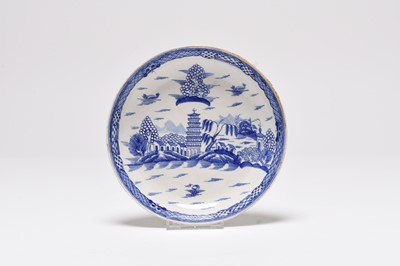 Lot 24 - A Caughley teapot, a cream jug and a saucer dish, late 18th century