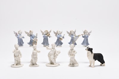 Lot 169 - Four Nymphenburg blanc de china models of putti, with six angel figures and a dog