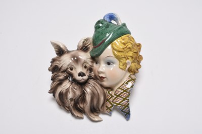 Lot 177 - Art Deco Italian wall mask of woman with dog