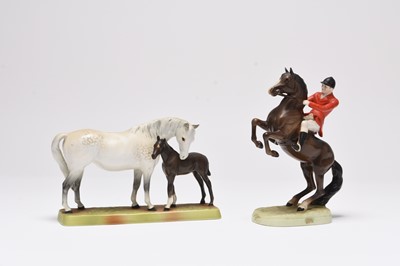 Lot 122 - Beswick models of a Mare with Foal and a Rearing Huntsman