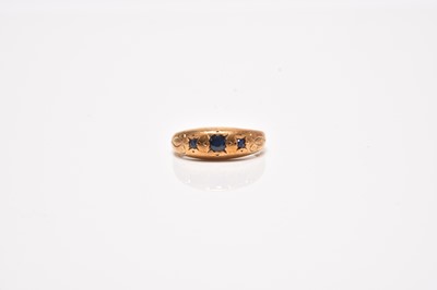 Lot 351 - A 9ct gold graduated three stone sapphire ring