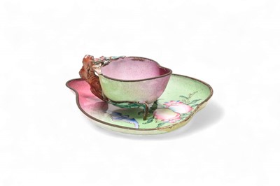 Lot 52 - A Chinese enamel 'peach' cup and saucer, Qing Dynasty