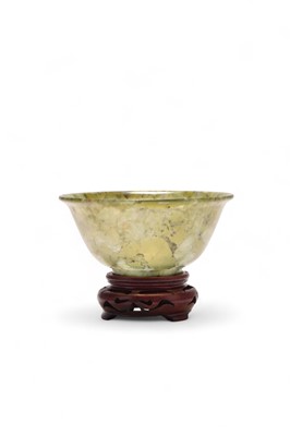 Lot 60 - A Chinese serpentine bowl, Qing Dynasty