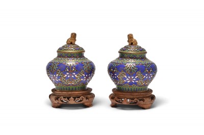 Lot 49 - A pair of small Chinese cloisonne jars and covers