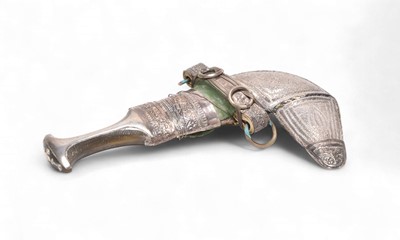 Lot 156 - An Arabian silver-mounted Jambiya dagger