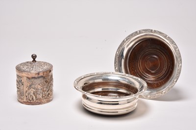 Lot 147 - A pair of modern silver mounted wine coasters
