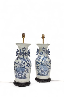 Lot 17 - A pair of Chinese blue and white vases converted to table lamps, 19th century