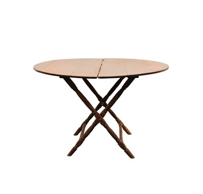 Lot 46 - A walnut folding campaign type table