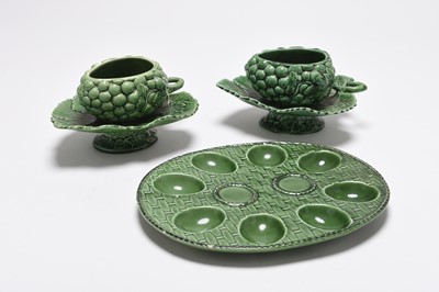 Lot 62 - Pair of majolica sauce tureens and a majolica devilled egg platter