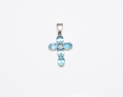 Lot 231 - A blue topaz cross pendant