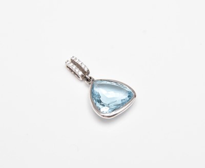 Lot 379 - A platinum blue topaz and diamond pendant