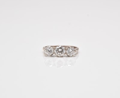 Lot 241 - An 18ct white gold three stone graduated diamond ring