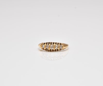 Lot 284 - An 18ct gold five stone diamond ring