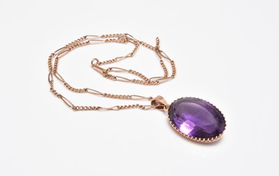 Lot 229 - An amethyst pendant on chain