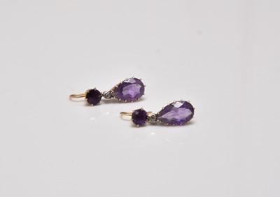 Lot 355 - A pair of late 19th / early 20th century amethyst ear pendants