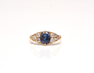 Lot 307 - A late 19th / early 20th century seven stone sapphire and diamond ring